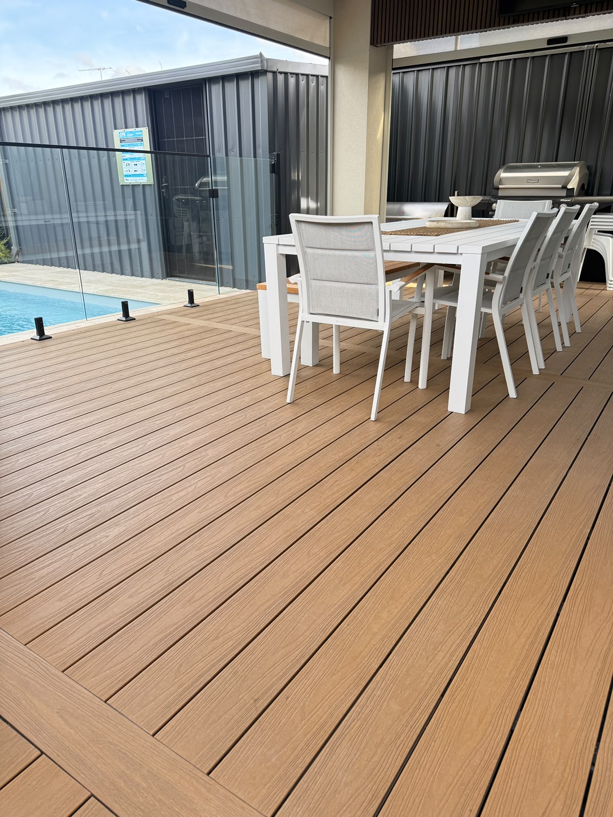 Composite decking around a pool